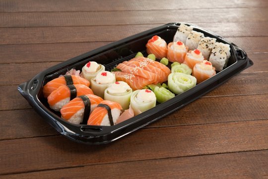 Set of assorted sushi served in a black box