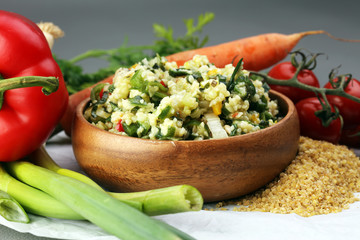 Tabbouleh salad with bulgur, parsley and vegetables -diet concep