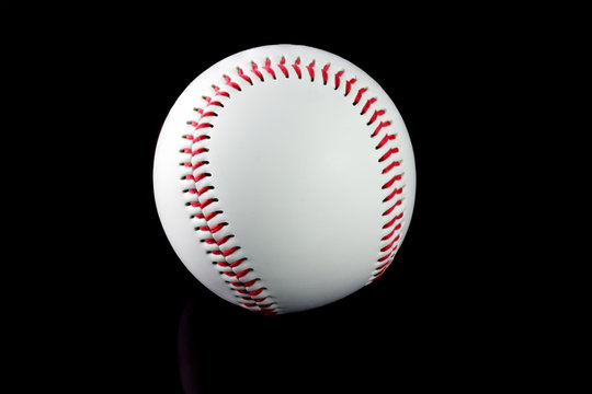 Baseball with brown background