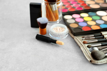 Set of decorative cosmetics on light background