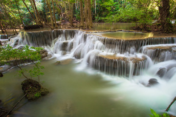 Fototapeta na wymiar Hui Mae Khamin waterfall in deep forest , Thailand