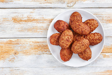 juicy delicious meat cutlets on white plate