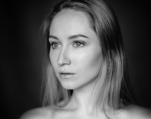 Fototapeta premium Black and white portrait of a beautiful young woman.