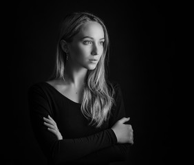Obraz premium Black and white portrait of a beautiful young woman.
