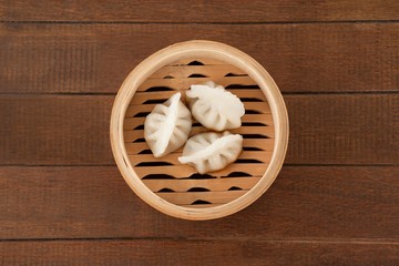 Dumplings in bamboo steamer