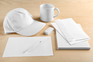 Blank office supplies on wooden background