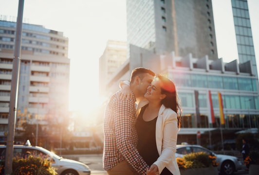 Kiss to the neck in the downtown of Warsaw