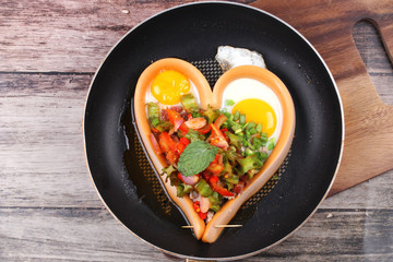 Sausage cheese in heart style with spicy wing bean salad.