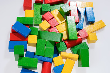 Toys blocks, multicolor wooden building bricks, heap of colorful game pieces