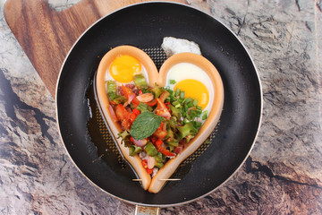 Sausage cheese in heart style with spicy wing bean salad.