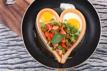 Sausage cheese in heart style with spicy wing bean salad.