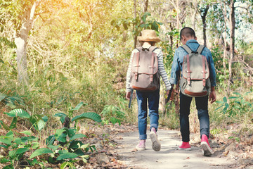 Happy Asian children backpack in nature background, Relax time on holiday