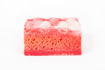 Sponge for a bathtub and Spa filled with aromatic soap. Isolated on a white background