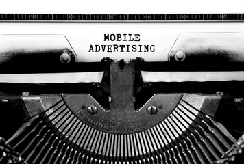 MOBILE ADVERTISING Typed Words On a Vintage Typewriter Conceptual