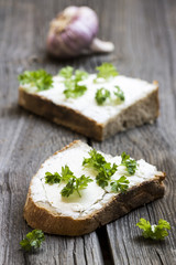Fresh Food. Bread Slices on Wooden Background. Vertical Photo Detail.