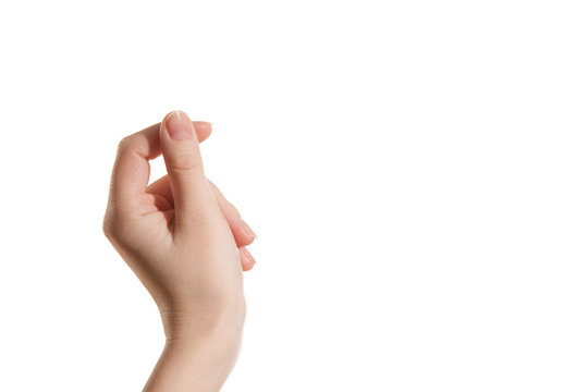 Female hand holding a virtual card with your fingers on a white background