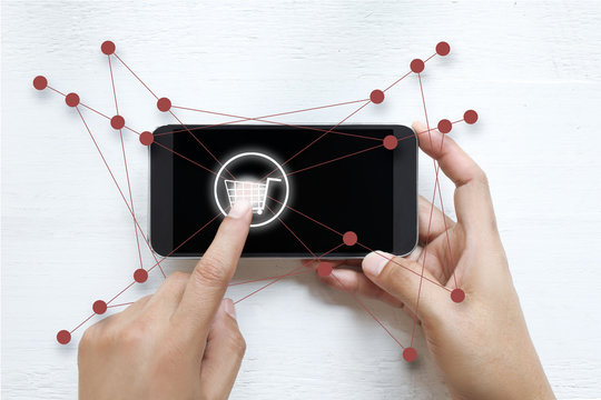 Man using mobile payments online shopping and icon customer network connection on screen, m-banking and omni channel