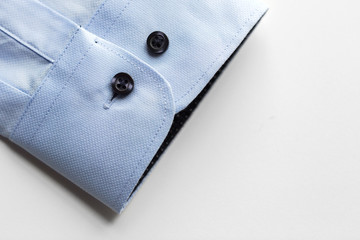 close up of blue shirt sleeve