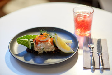 close up of toast skagen with caviar and bread