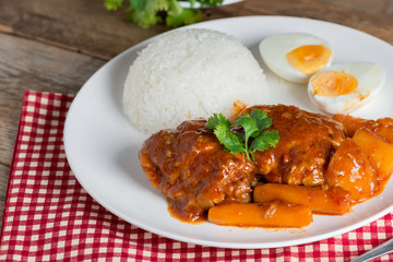  Chicken stew with sauce tomato and egg, rice.