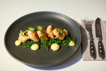 close up of prawn salad with jalapeno and wakame