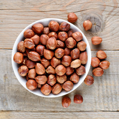 Hazelnuts in bowl top view