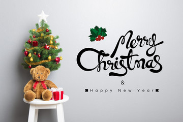 MERRY CHRISTMAS and HAPPY NEW YEAR text on the wall