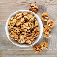 Walnuts in bowl top view