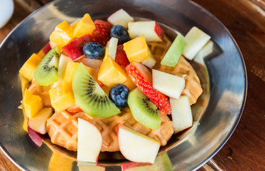 Waffle with fresh organic mixed fruit