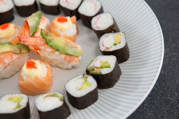 Various sushi served on plate