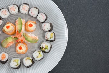 Various sushi served on plate