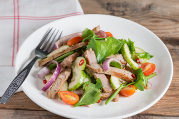 Spicy salad of grilled beef, Thai style food.