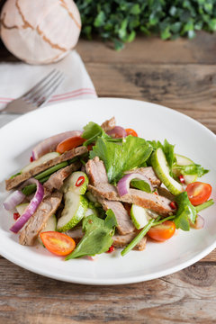 Spicy salad of grilled beef, Thai style food.