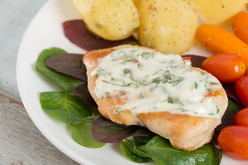 Grilled Chicken steak topping spinach sauce with vegetable