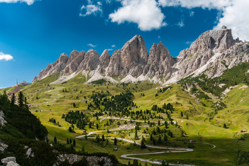 Obraz premium Dolomites landscape with mountain road. Italy