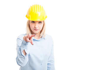 Female architect making watching you gesture