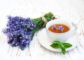 Cup of tea and lavender flowers
