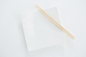 Chopstick with empty plate