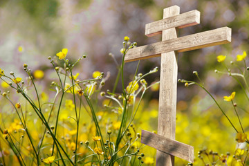 Old wooden cross in the sun