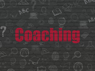 Studying concept: Coaching on wall background