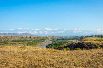 Naklejka premium River, meadow and snowy mountains, Azerbaijan