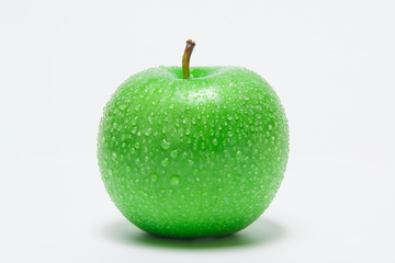 Closeup green apple with water-drops