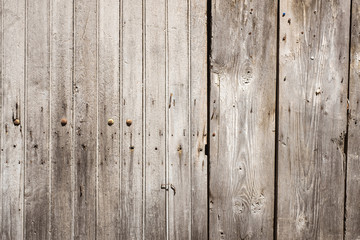 Fototapeta premium Outside wall of brown wooden planks