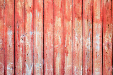 Outside wall of red wooden planks