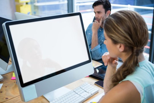 Beautiful Woman Working On Desktop Pc 