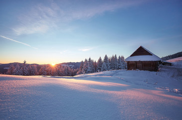Shepherds house in the Carpathian Mountains in winter