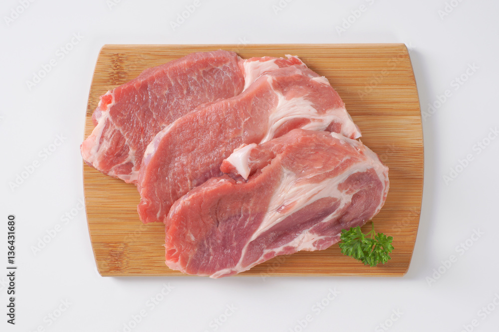 Sticker raw pork steaks