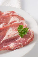 raw pork neck steaks