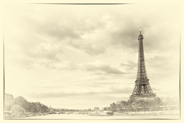 Vintage The Eiffel Tower and the river Seine at sunset sky background in Paris
