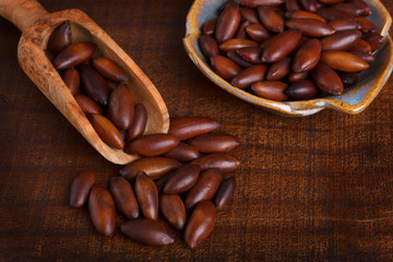 Baru almond on wooden background